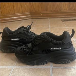 Black Steve Madden possessions